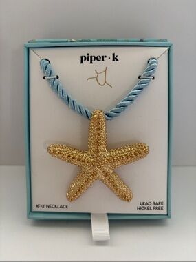 Piper-K Gold Starfish Pendant Necklace on Light Blue Cord